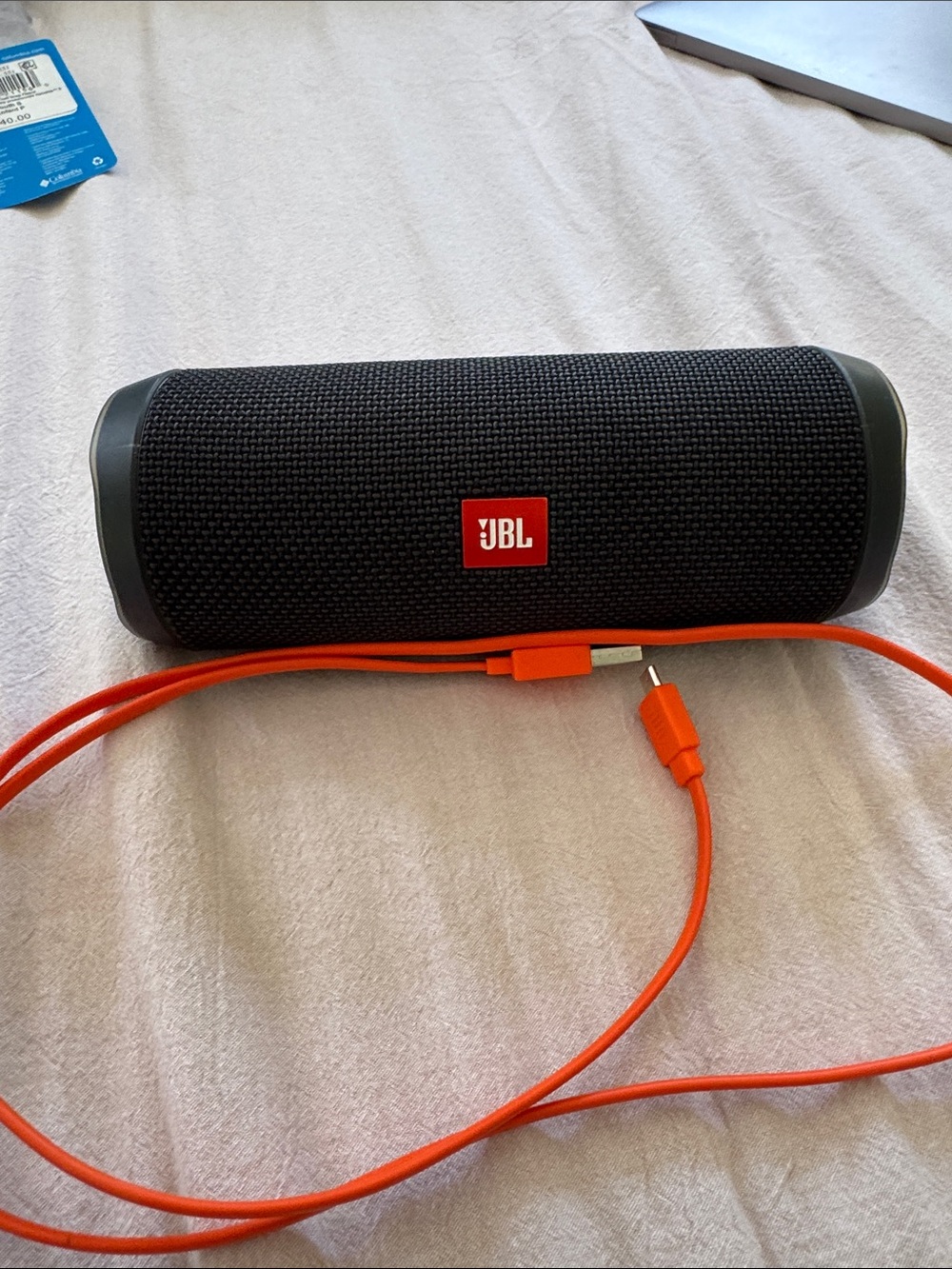 JBL Black Portable Bluetooth Speaker with Orange Charging Cable